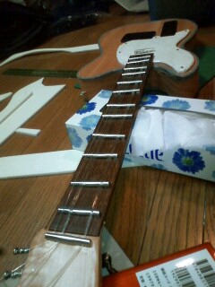 �����[��